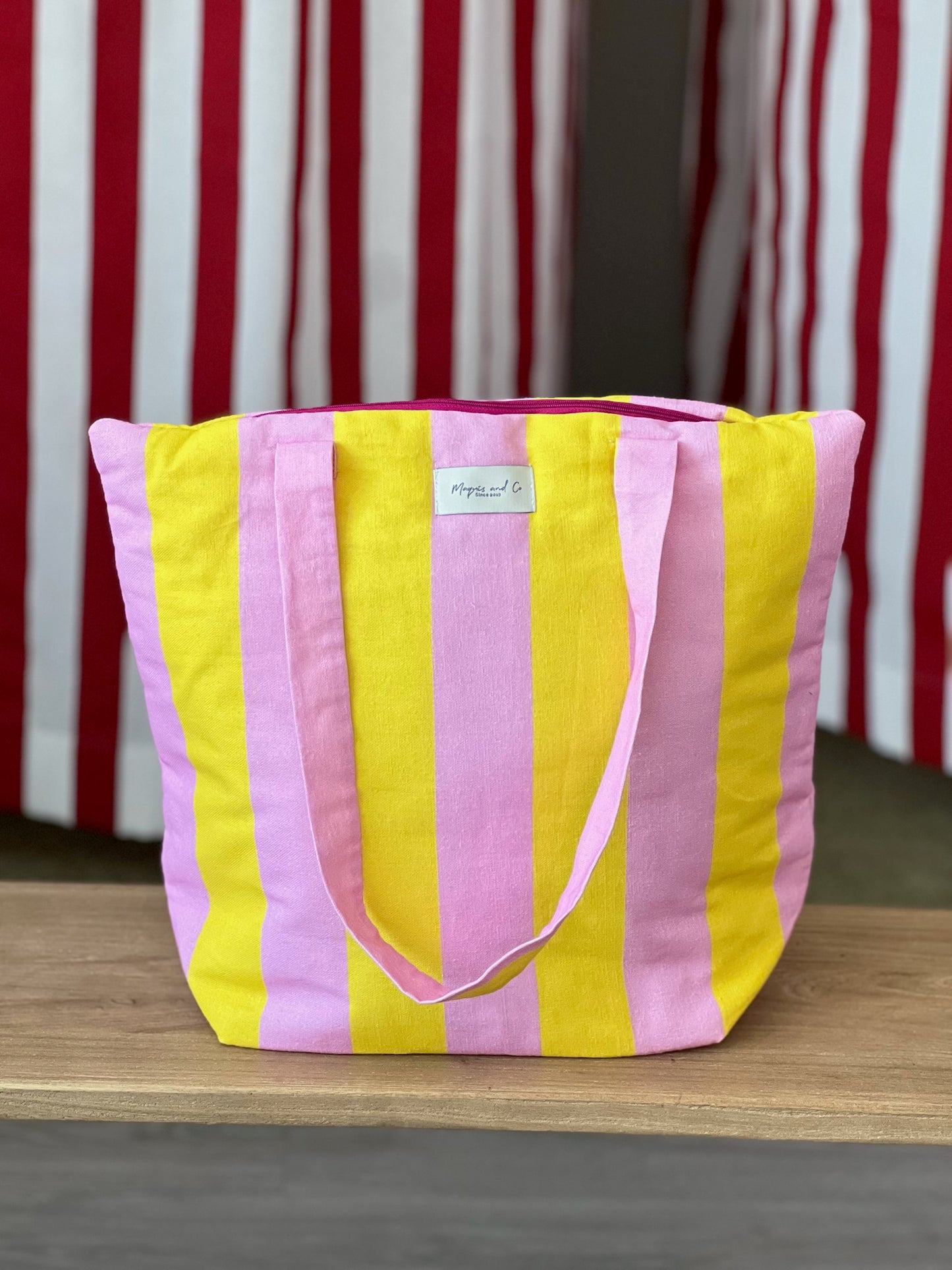 BOLSA CAROLA -  RAYAS AMARILLAS Y ROSAS