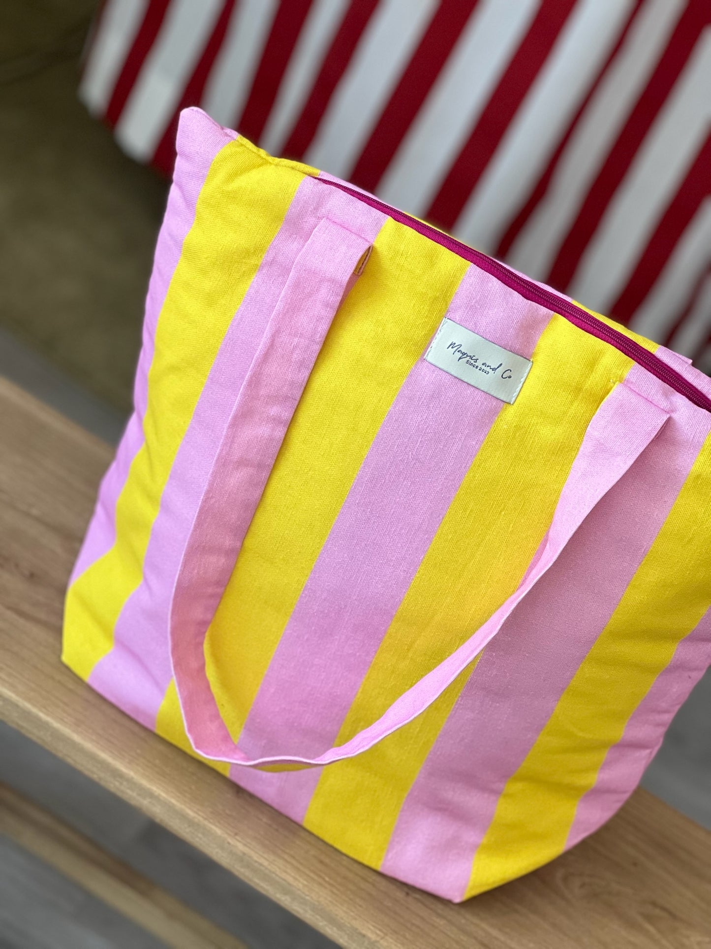 BOLSA CAROLA -  RAYAS AMARILLAS Y ROSAS