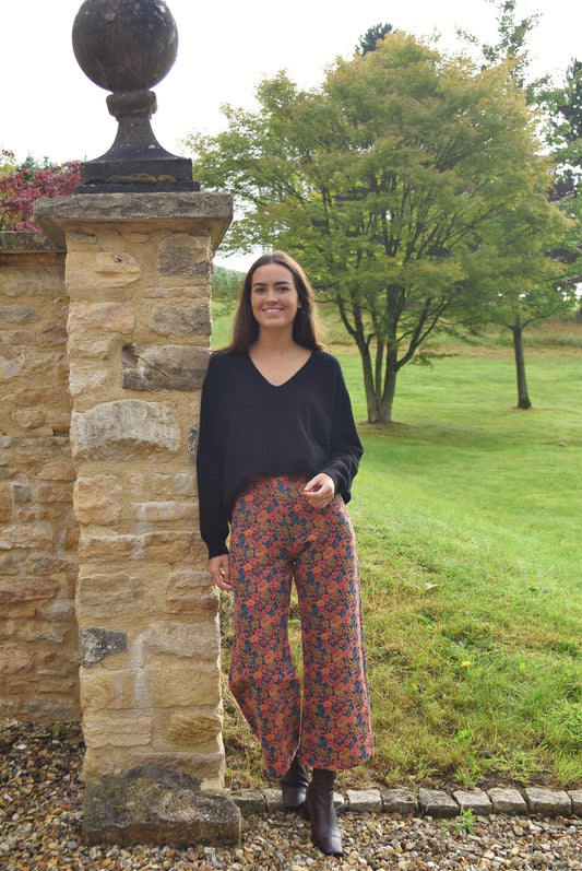 PANTALONES SOL - FLORES NARANJA -