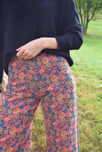 PANTALONES SOL - FLORES NARANJA -