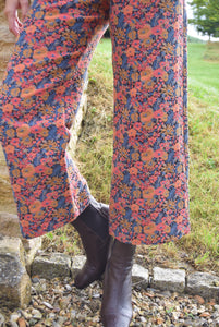 PANTALONES SOL - FLORES NARANJA -