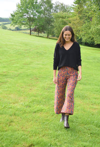 PANTALONES SOL - FLORES NARANJA -